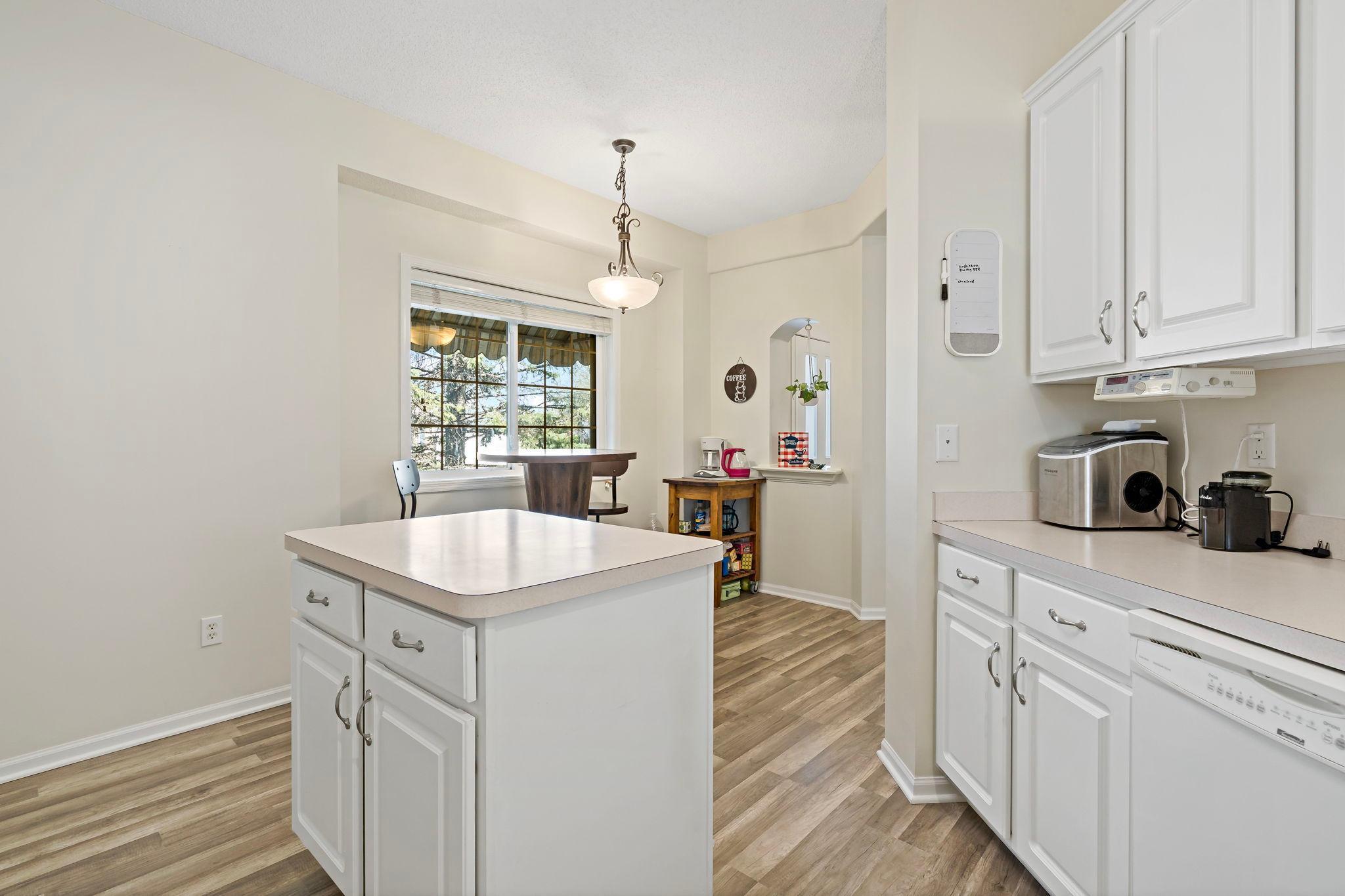 Kitchen has the perfect amount of space for causal meals or breakfast coffee