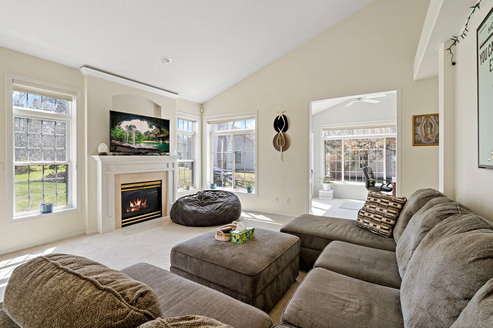 Enjoy the cozy warmth of the gas fireplace.. And all the openness