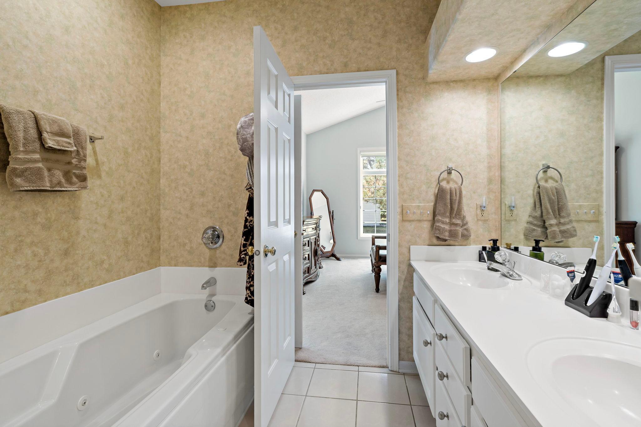 Lay back and relax in this oversize jetted tub