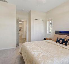 The impressively large second bedroom is filled with space and overlooks the side of the home