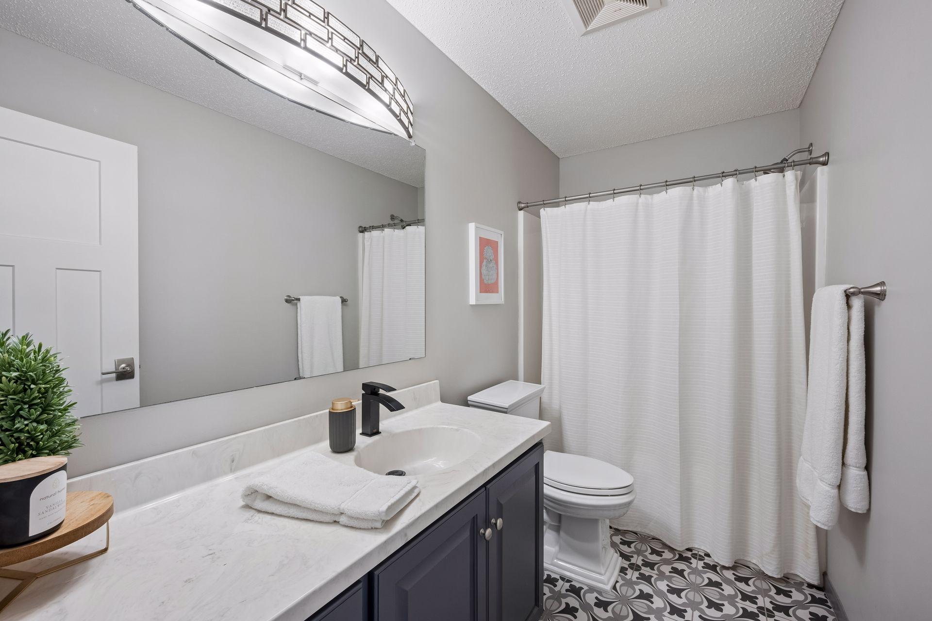 Additional full bathroom up that has been tastefully updated