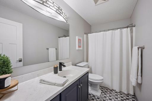 Additional full bathroom up that has been tastefully updated