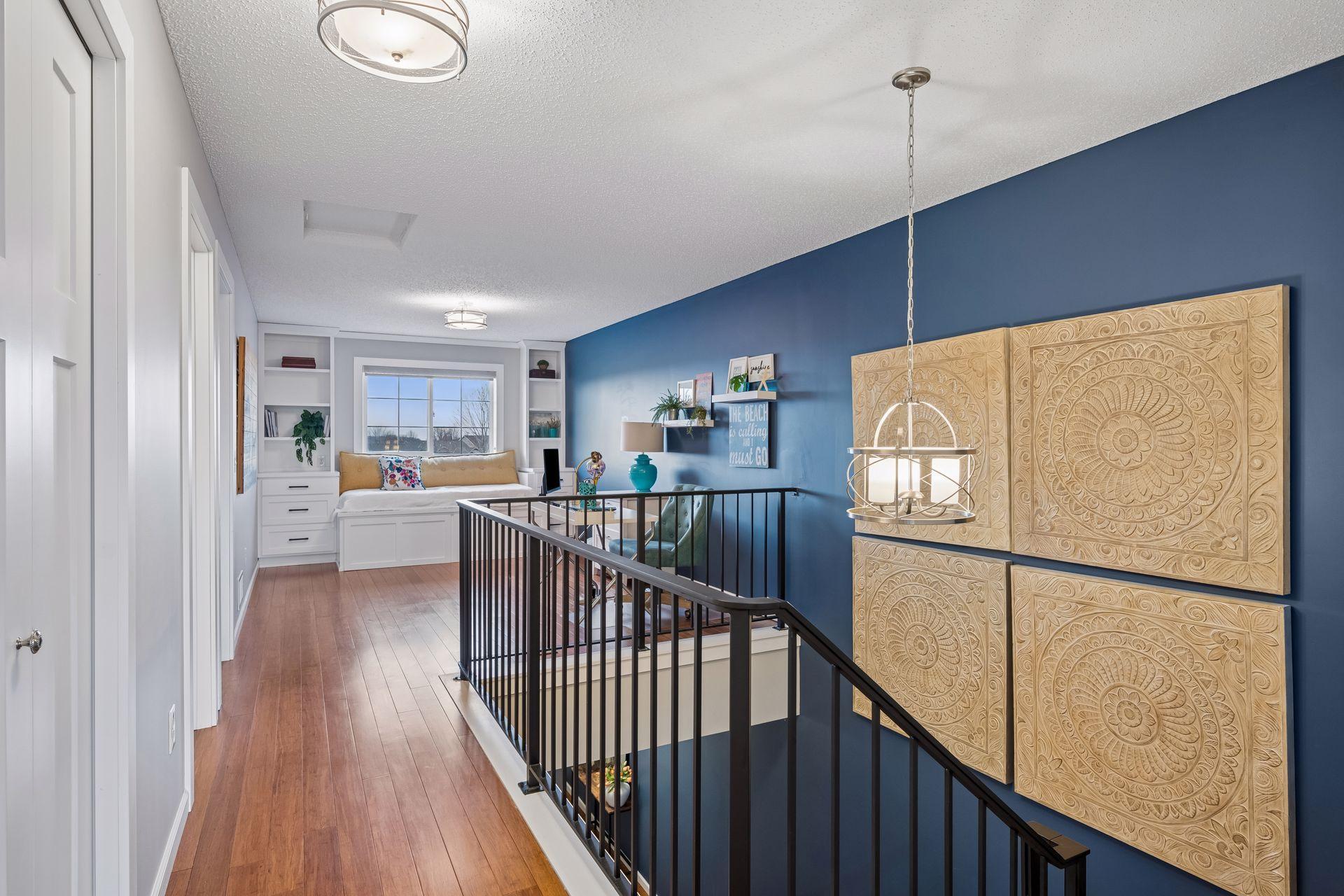 Upstairs features new lighting and modern railings