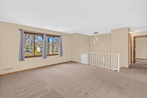 Living Room. Note New Chandelier in Foyer