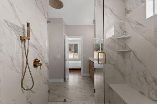 Glass enclosed and full bench seat in Walk-in shower