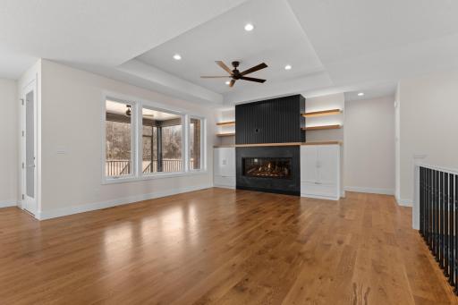 European plaster surrounds the linear fireplace