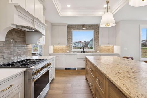 Decorative tile backsplash and farmhouse sink