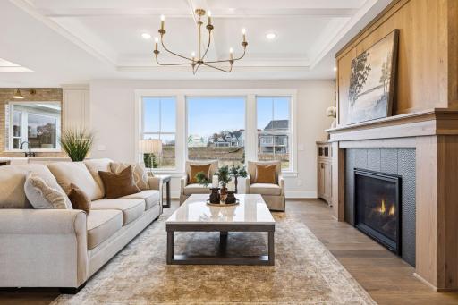 Large picture windows engulf the home in natural light