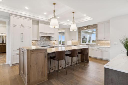 Spacious island with natural wood tonesâperfect for meal prep, dining, and entertaining