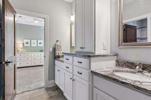 Jack + Jill style with large bathroom connecting bedrooms 2 & 3