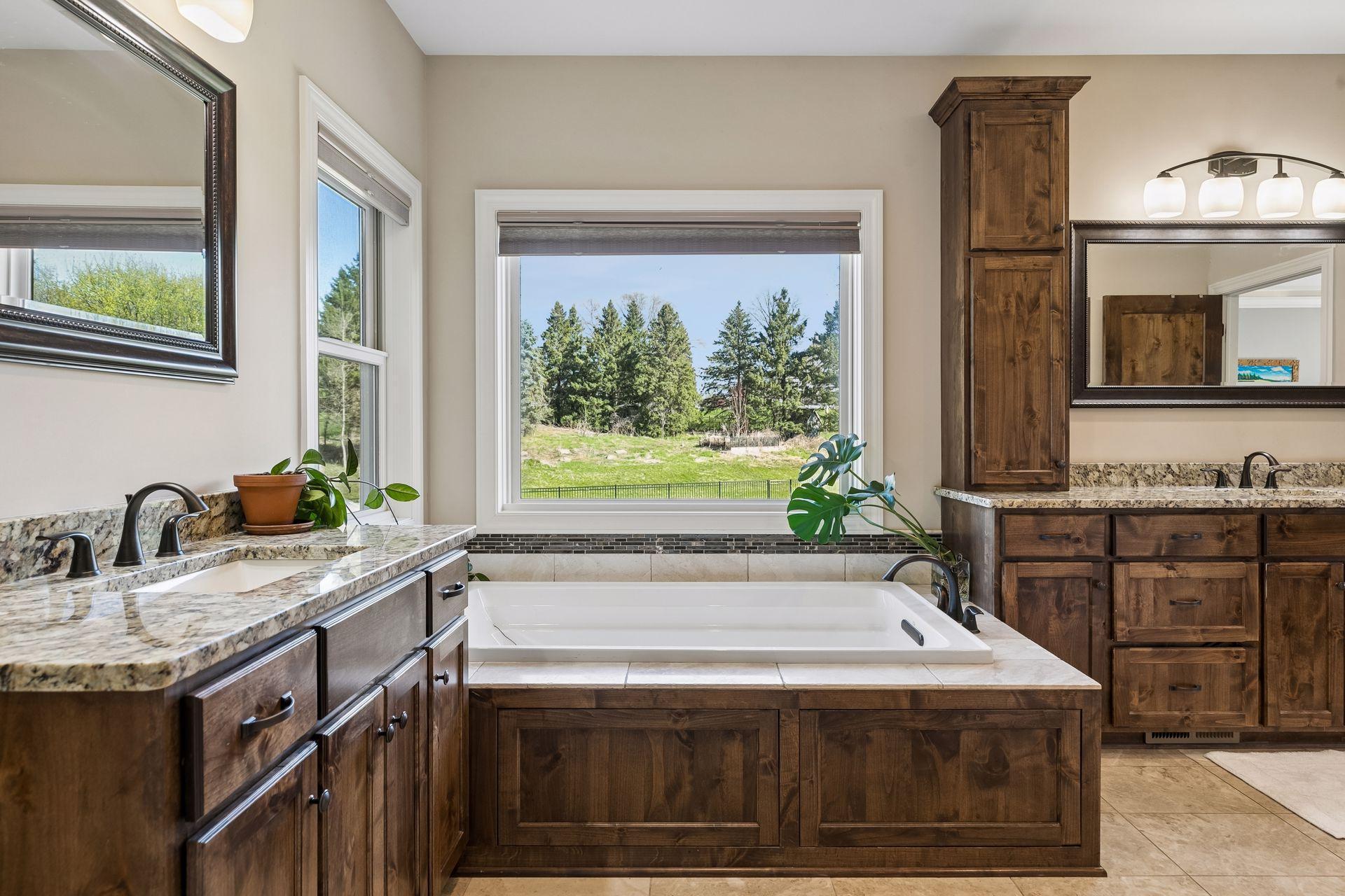 Primary bathroom, 2 vanities, closed toilet room