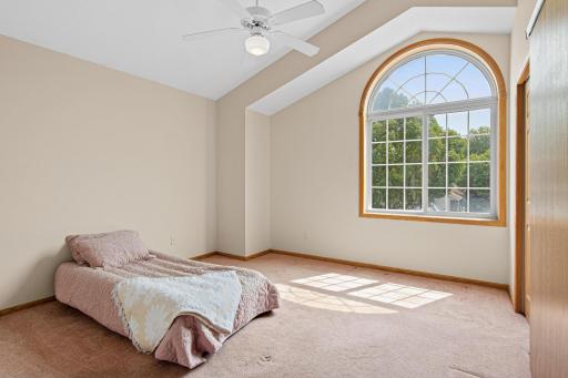 A large 2nd ensuite upstairs complete with its own 3/4 bath and walk-in closet!
