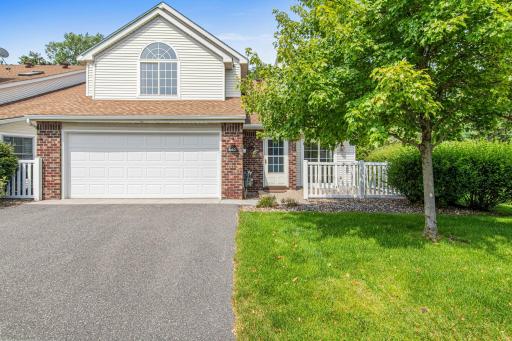 Welcome! Come tour this wonderful townhome. This unique end-unit floor plan with vaulted ceilings is flooded with light! Enjoy having a 2-car garage! Nobody can ever have a big enough garage right?