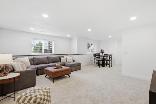 Recessed lighting and lookout windows make this lower level filled with tons of light.