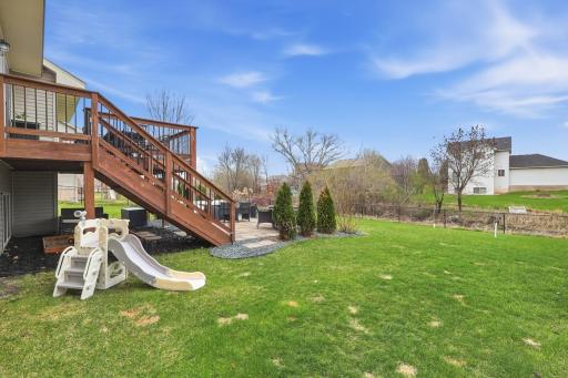 Incredible fenced in backyard that boasts privacy when all the trees fill in!