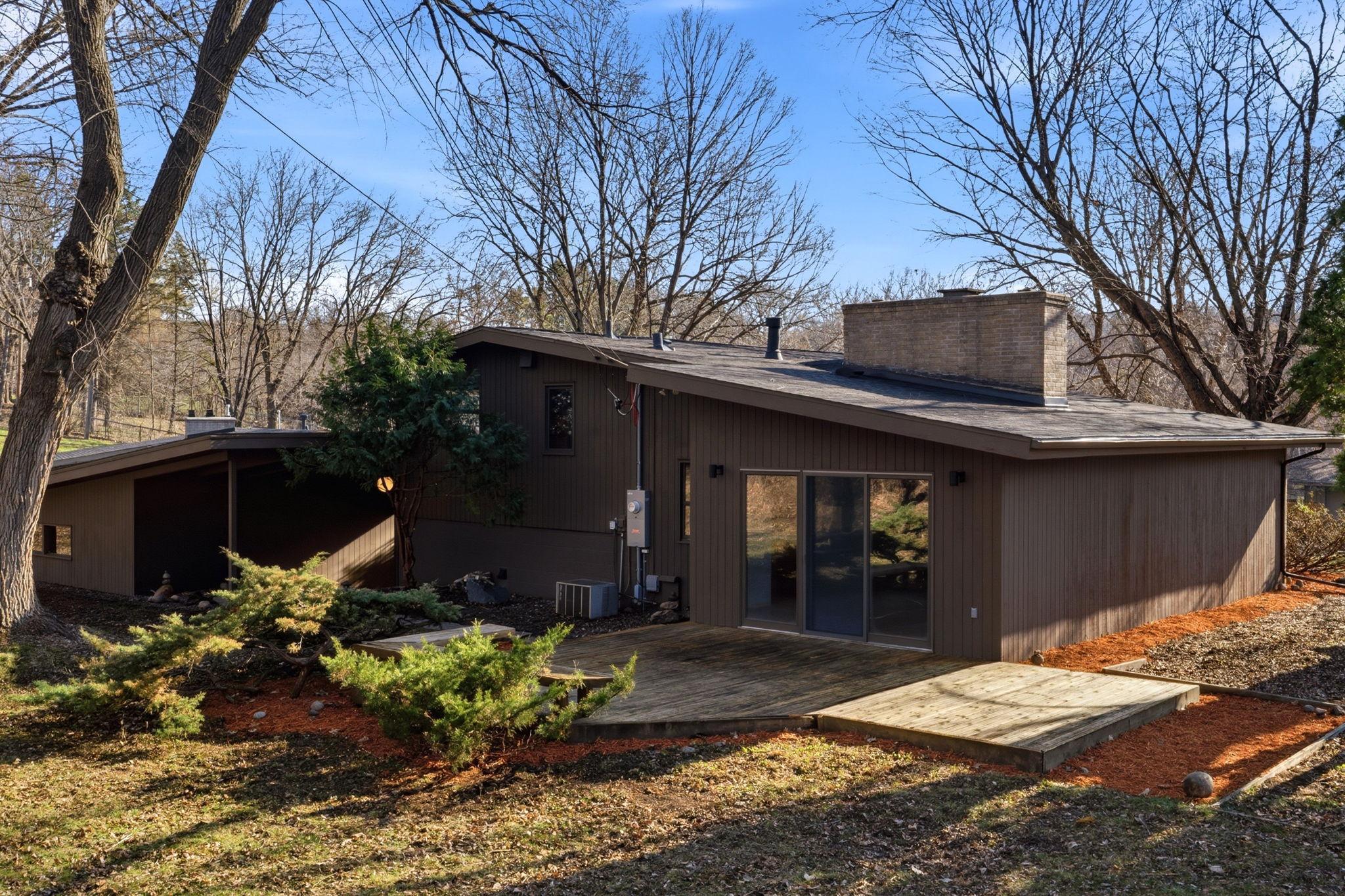 With a massive rear yard and deck for enjoying sunsets over dinner.