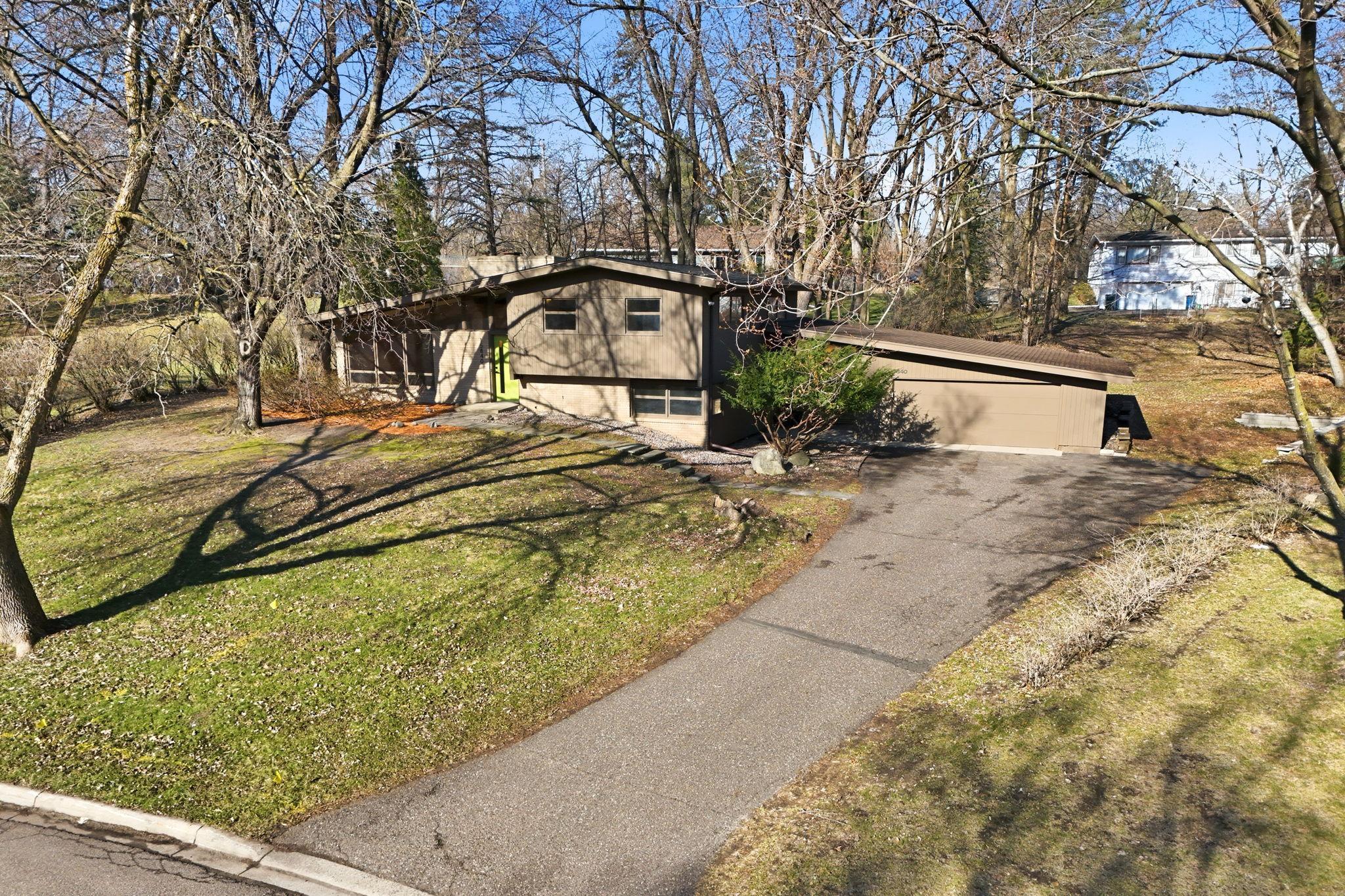 This home prominently looks over the nearby community pond.