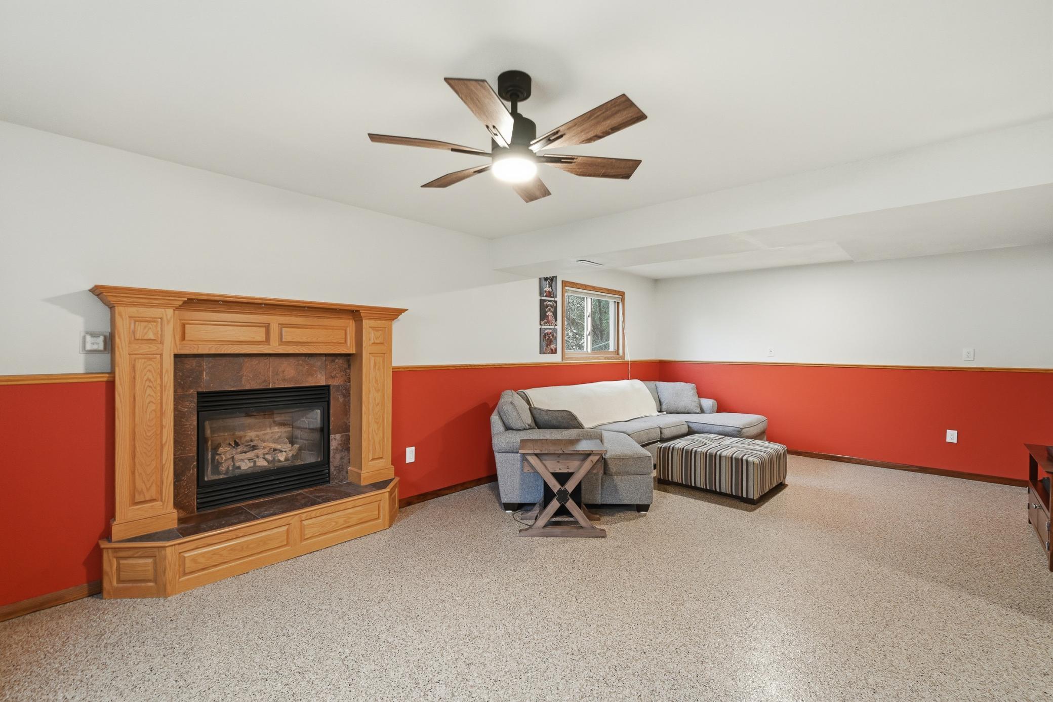 Basement living room with fireplace