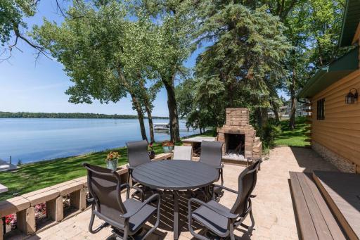 Plenty of room for seating any size family from the Beautiful paver patio.
Notice the wood burning fire place