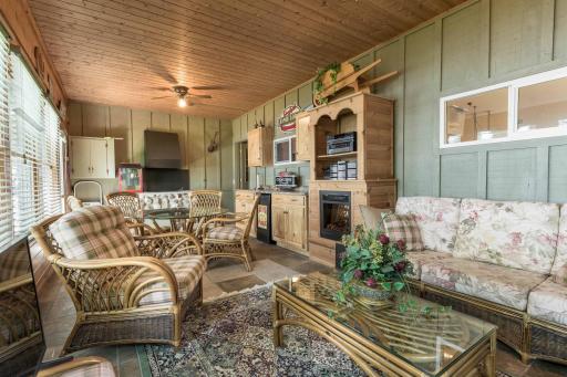 Large 3 season porch with full front windows to lake