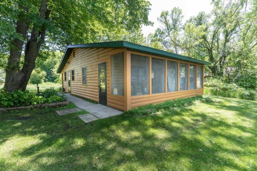 Bunk house complete with Full Screen Porch to lake with panaramic views.