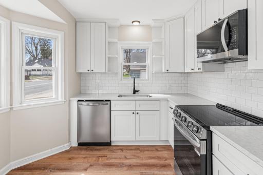 Bay window, wine rack & hard surface counter tops