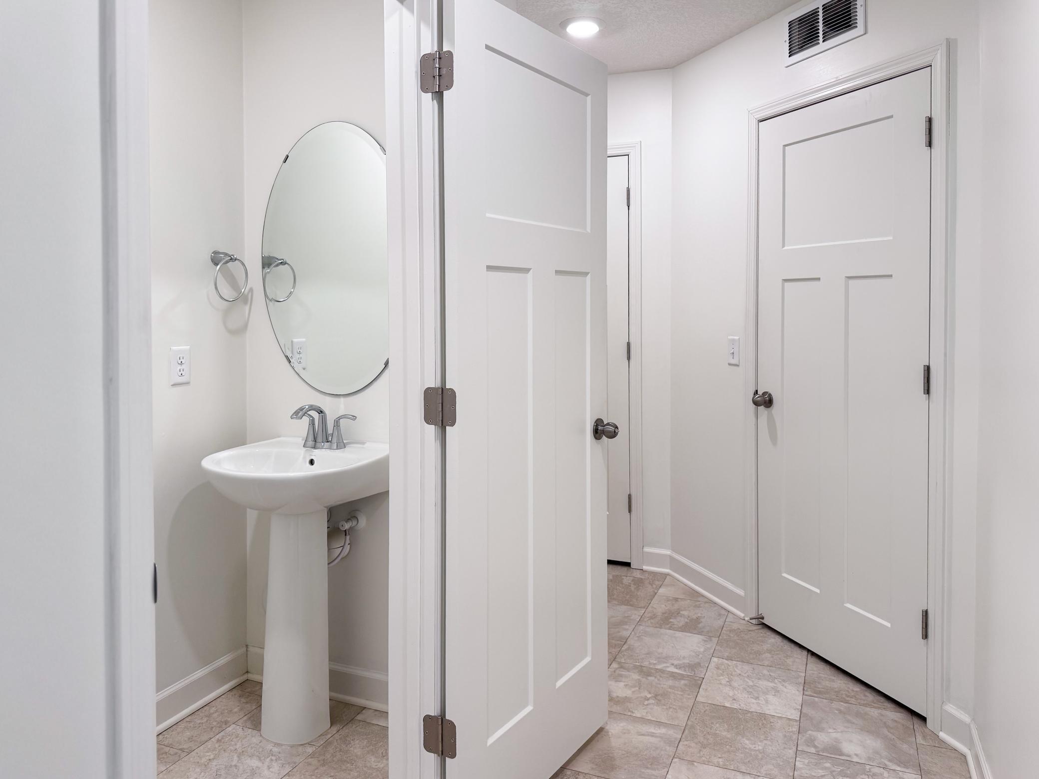 Convenient half bath right off the main living area