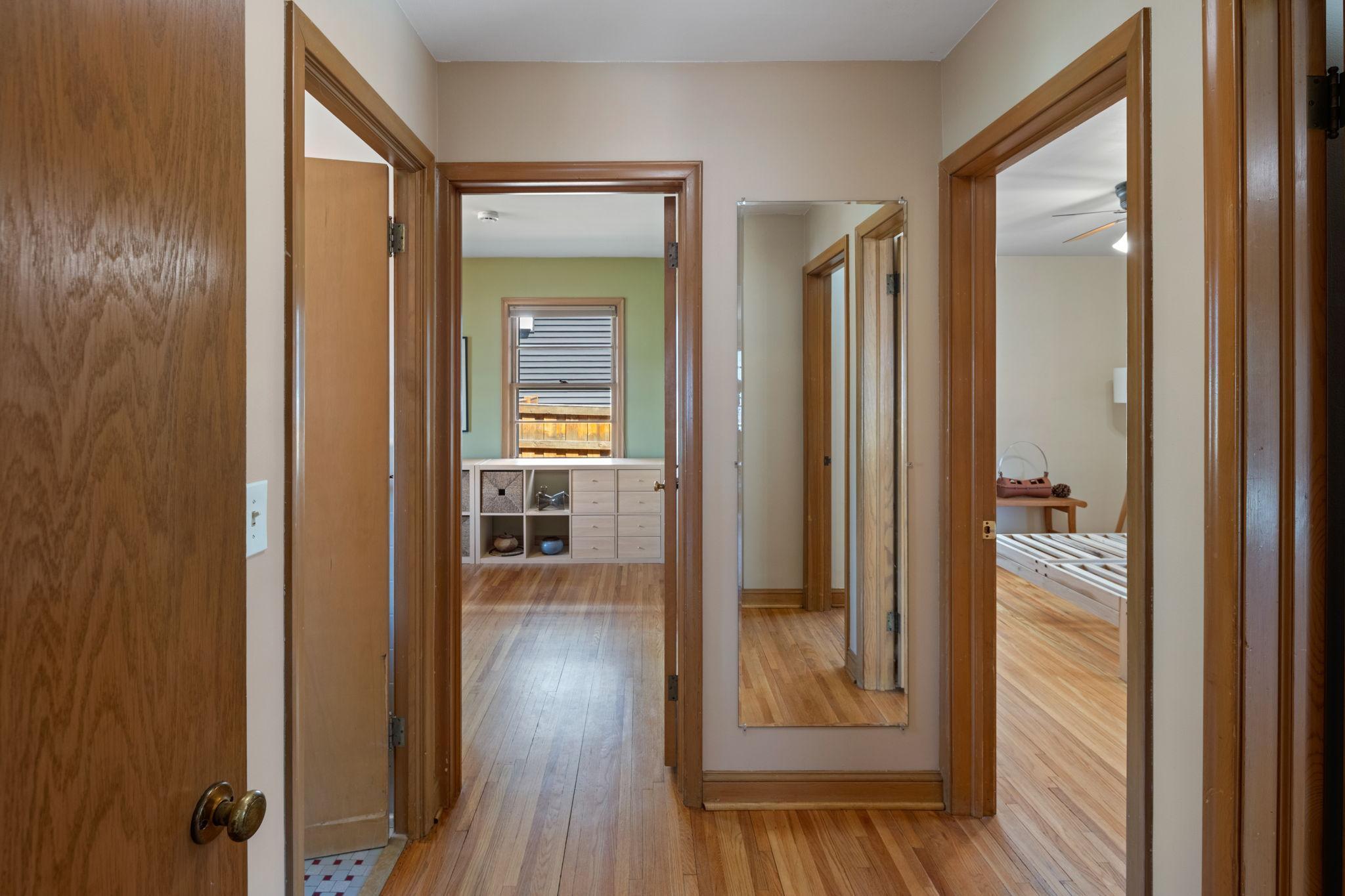 Hallway to provide a transition space between bedrooms and living room