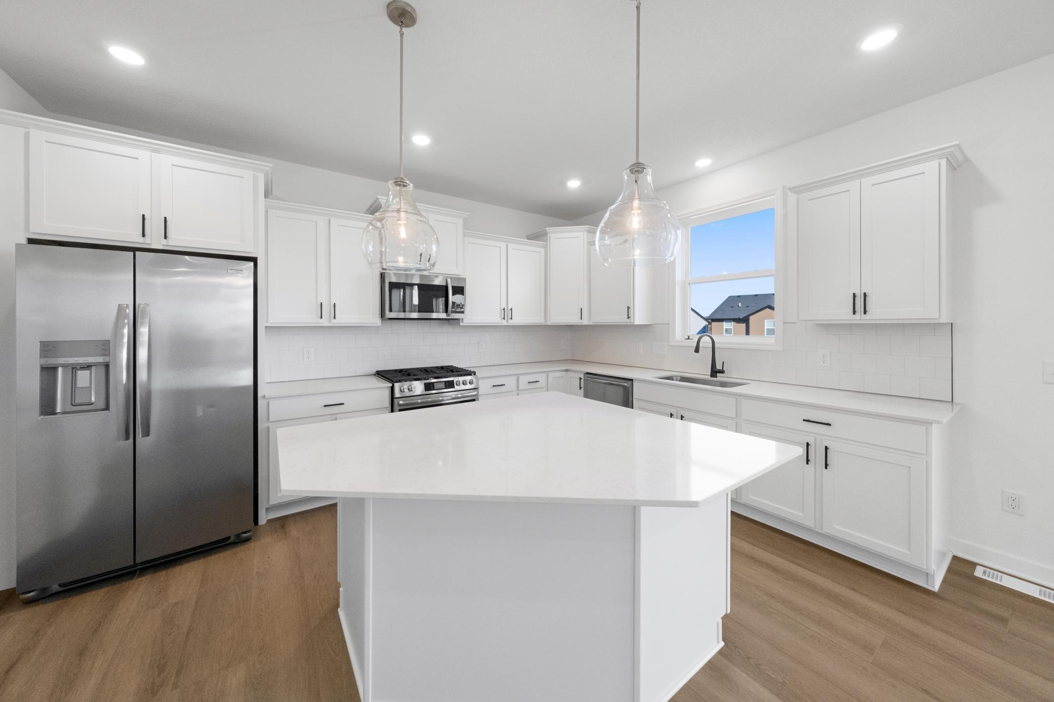 (All the following photos are of a similar home, actual finishes may vary.)