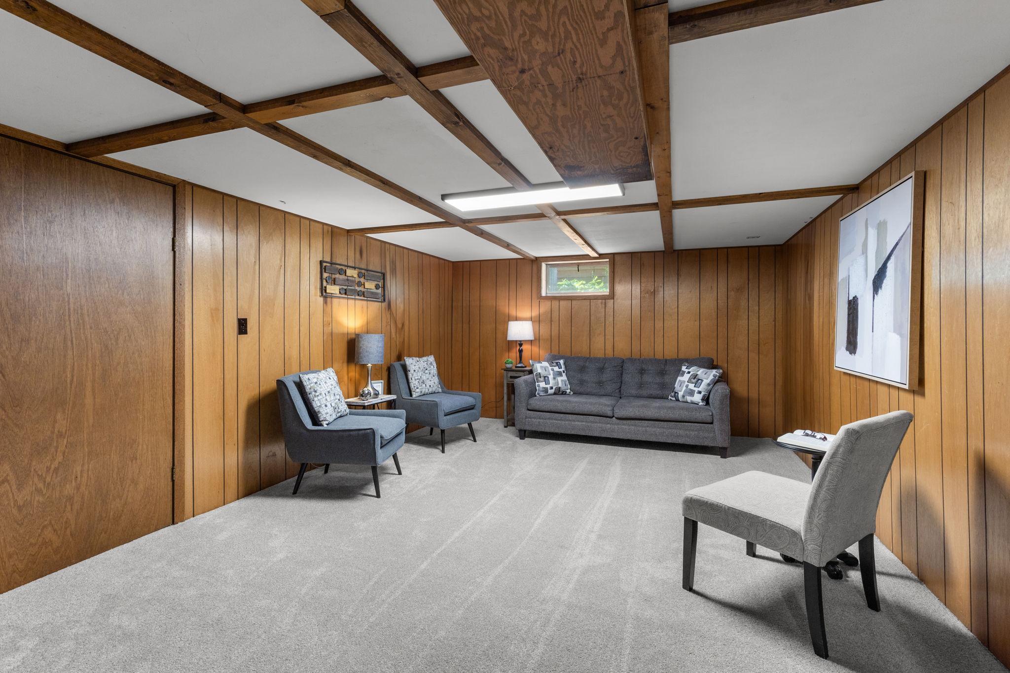 Large recreation room in lower level has ample space for all your entertaining needs.