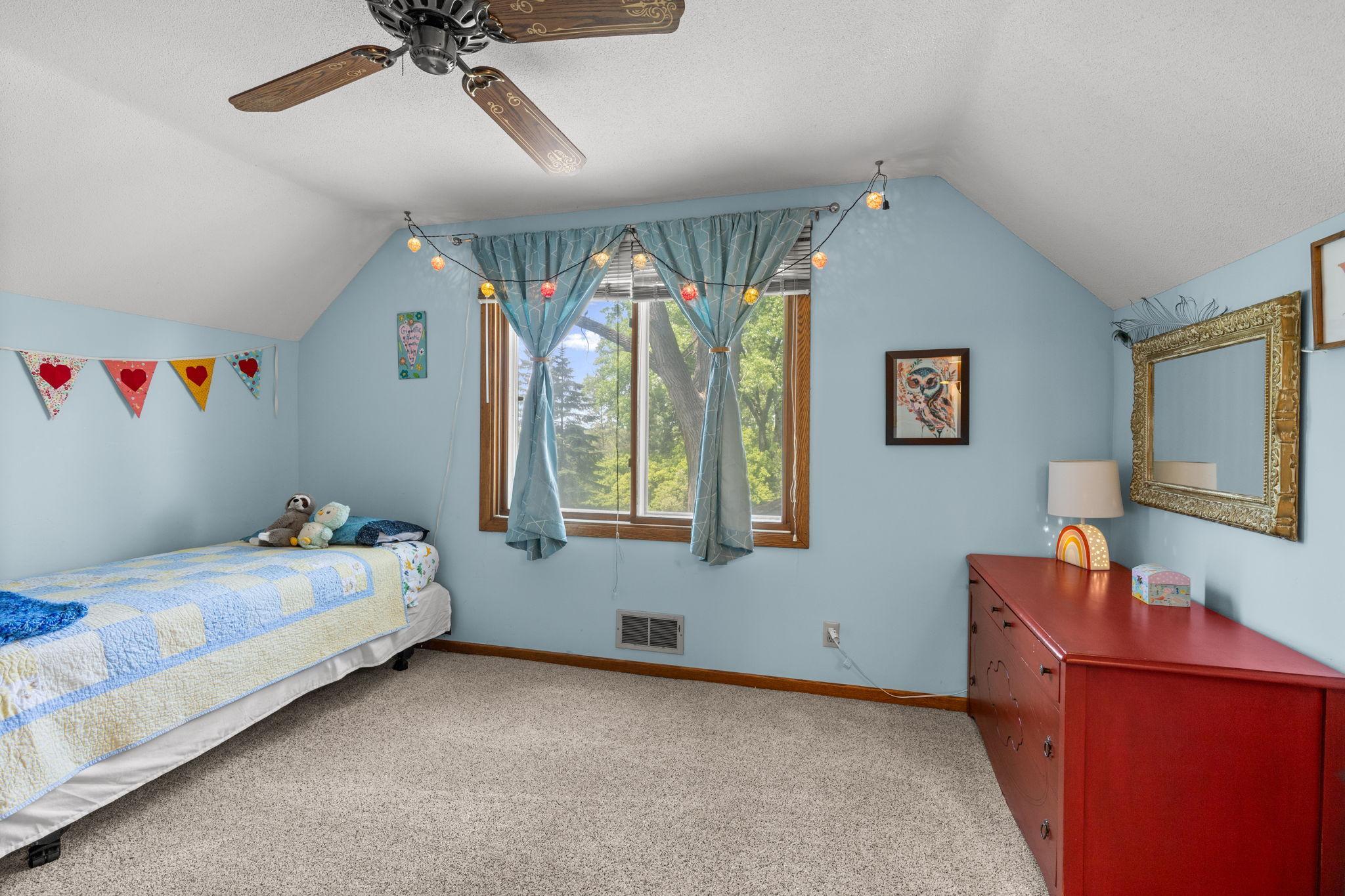Ceiling fan and large window are features you'll enjoy.