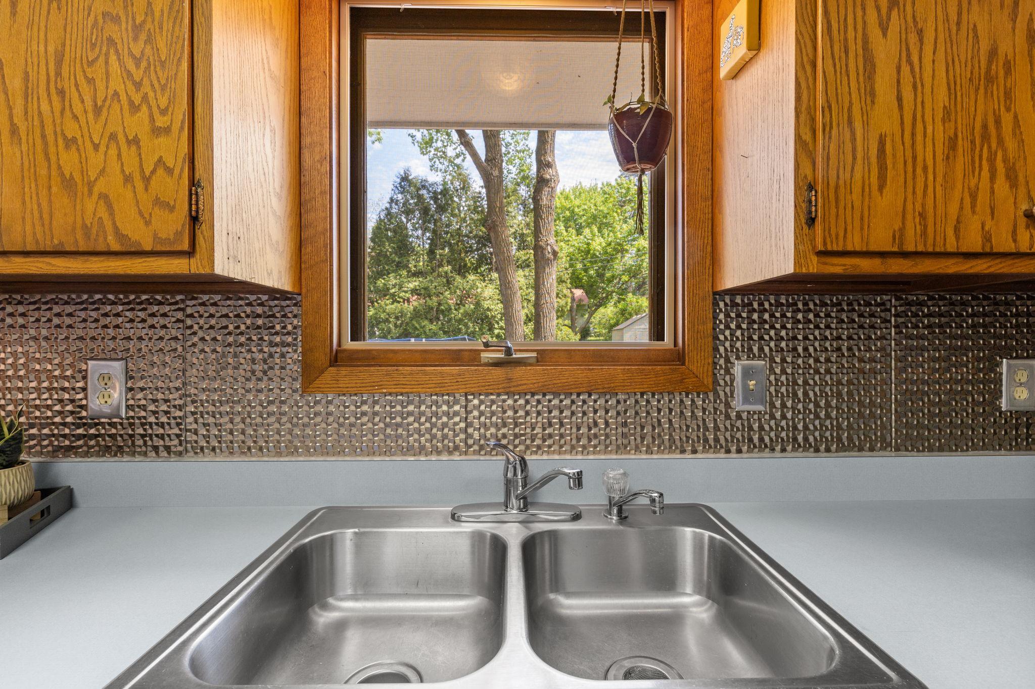 Enjoy views of the backyard from the kitchen window