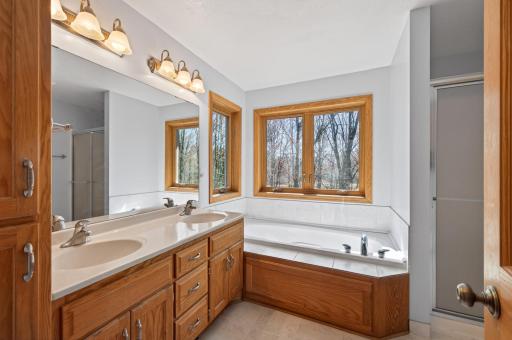 Private primary ensuite - dual vanity and jetted tub!
