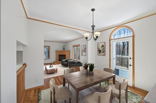 Welcome in! Natural light and gleaming hardwood floors greet you!