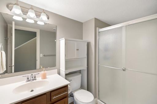 Conveniently located and thoughtfully appointed, the lower level bathroom is perfectly suited for guests and everyday use alike.