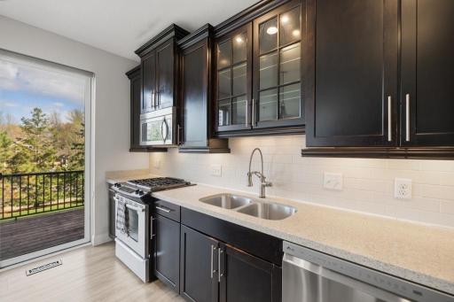 Storage, style, and a gas range â this kitchen was designed with both form and function in mind.