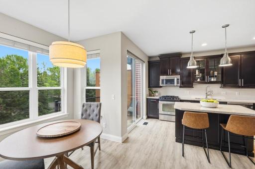 Surrounded by windows and just steps from the kitchen, the dinette is a bright and charming spot for everything from a casual breakfast to a leisurely dinner.