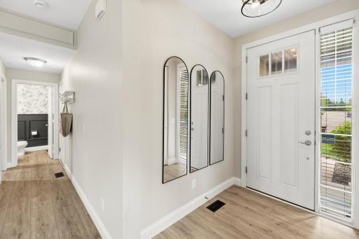 A warm and welcoming entry sets the tone for everything that follows.