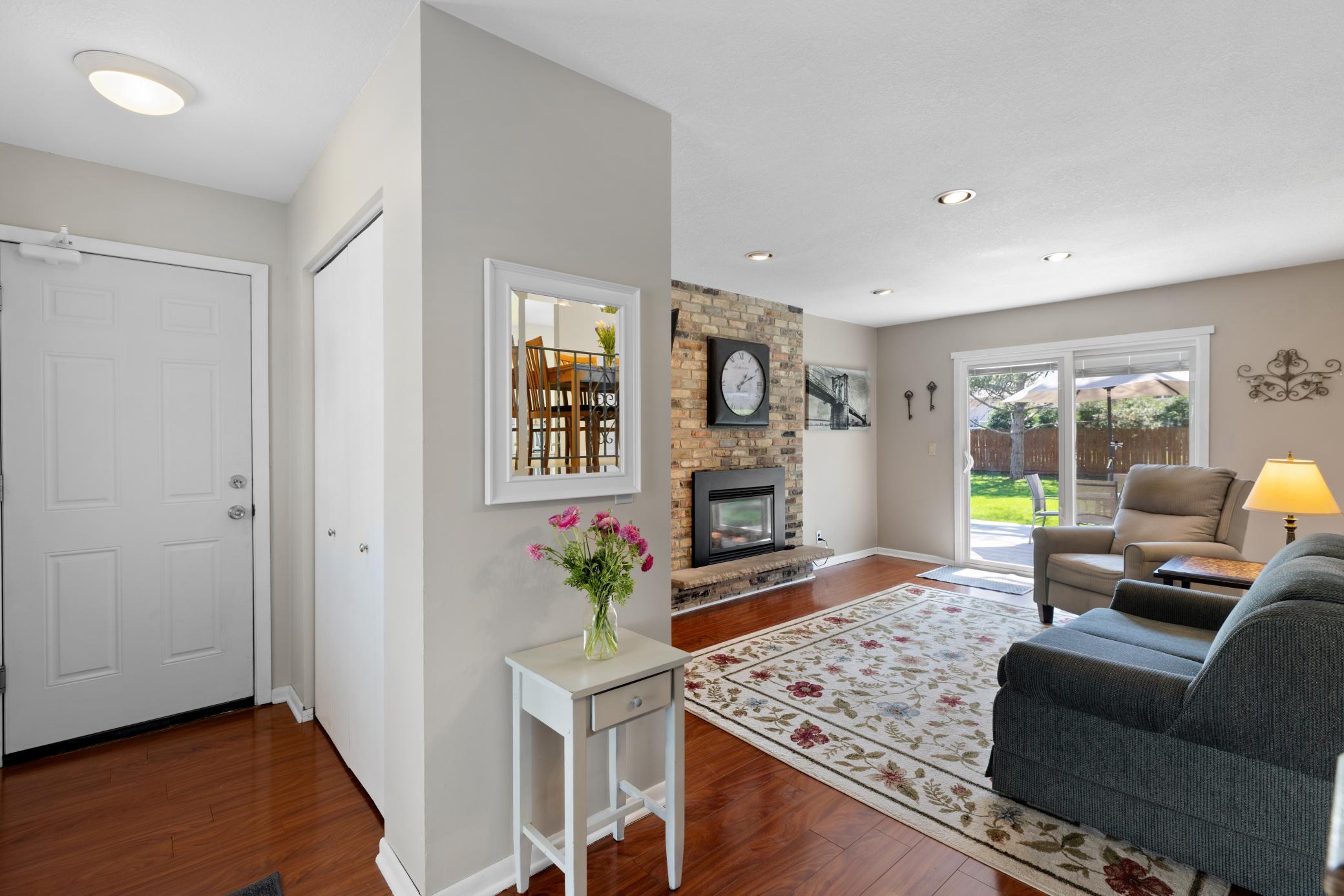 Main level Family Room has laminate flooring and walks out to beautiful backyard! Entry has spacious coat closet.