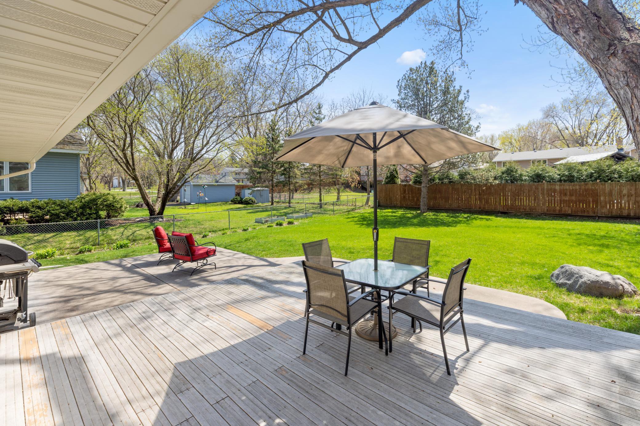 Beautiful deck and patio for backyard barbecues, entertaining family and friends or just relaxing!