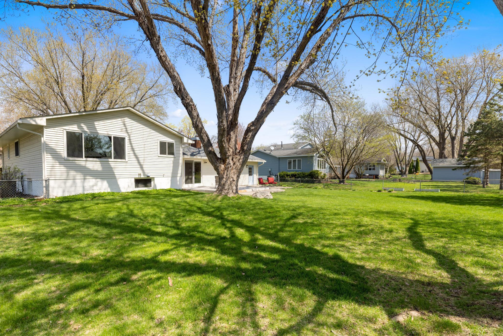 Expansive, flat backyard is fully fenced!