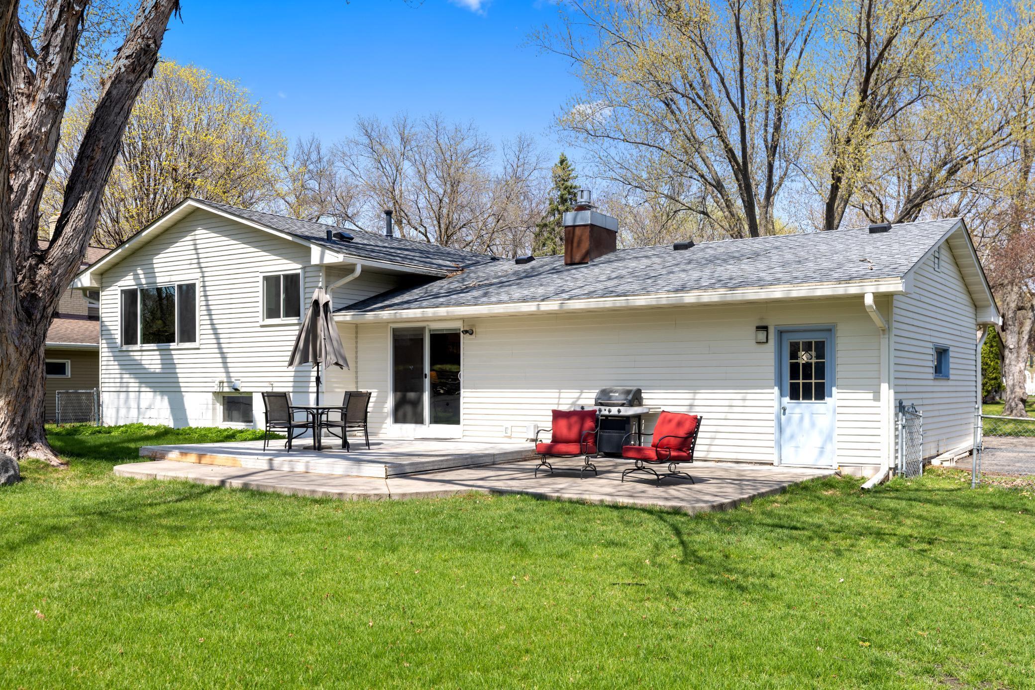 View of Deck and Patio. Garage has access door to backyard!