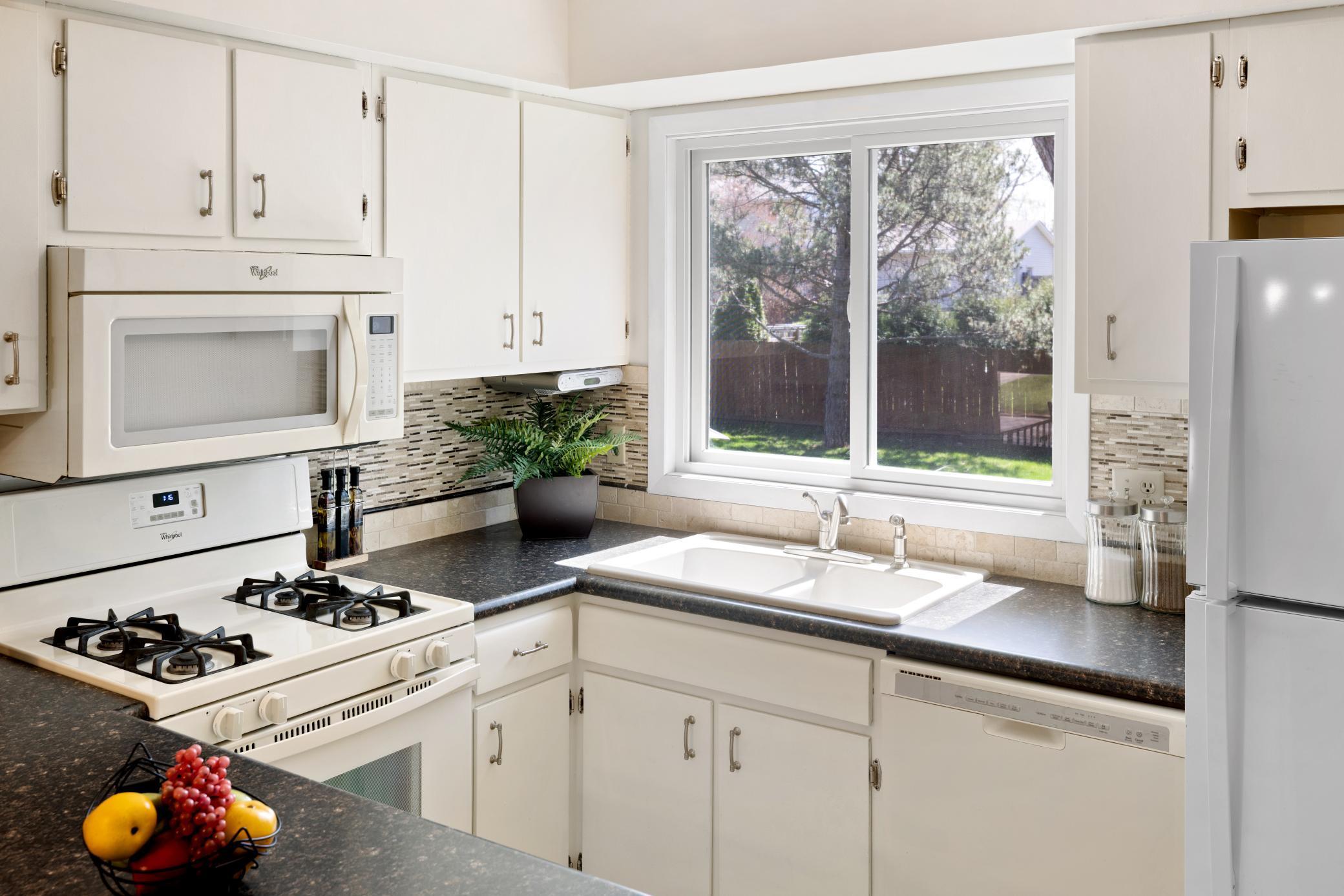 Updated Kitchen window and tile backsplash!