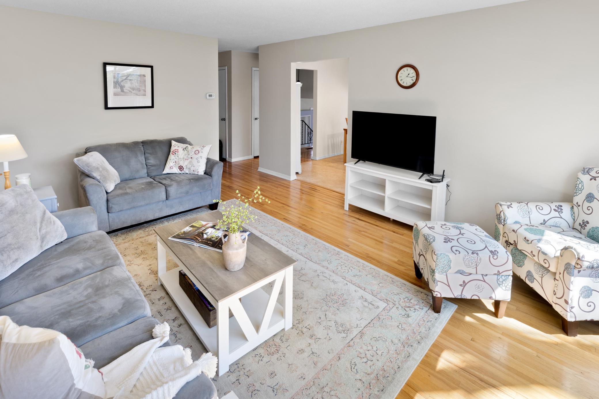 There is a generous seating area making for a fabulous gathering space only steps from the Kitchen.