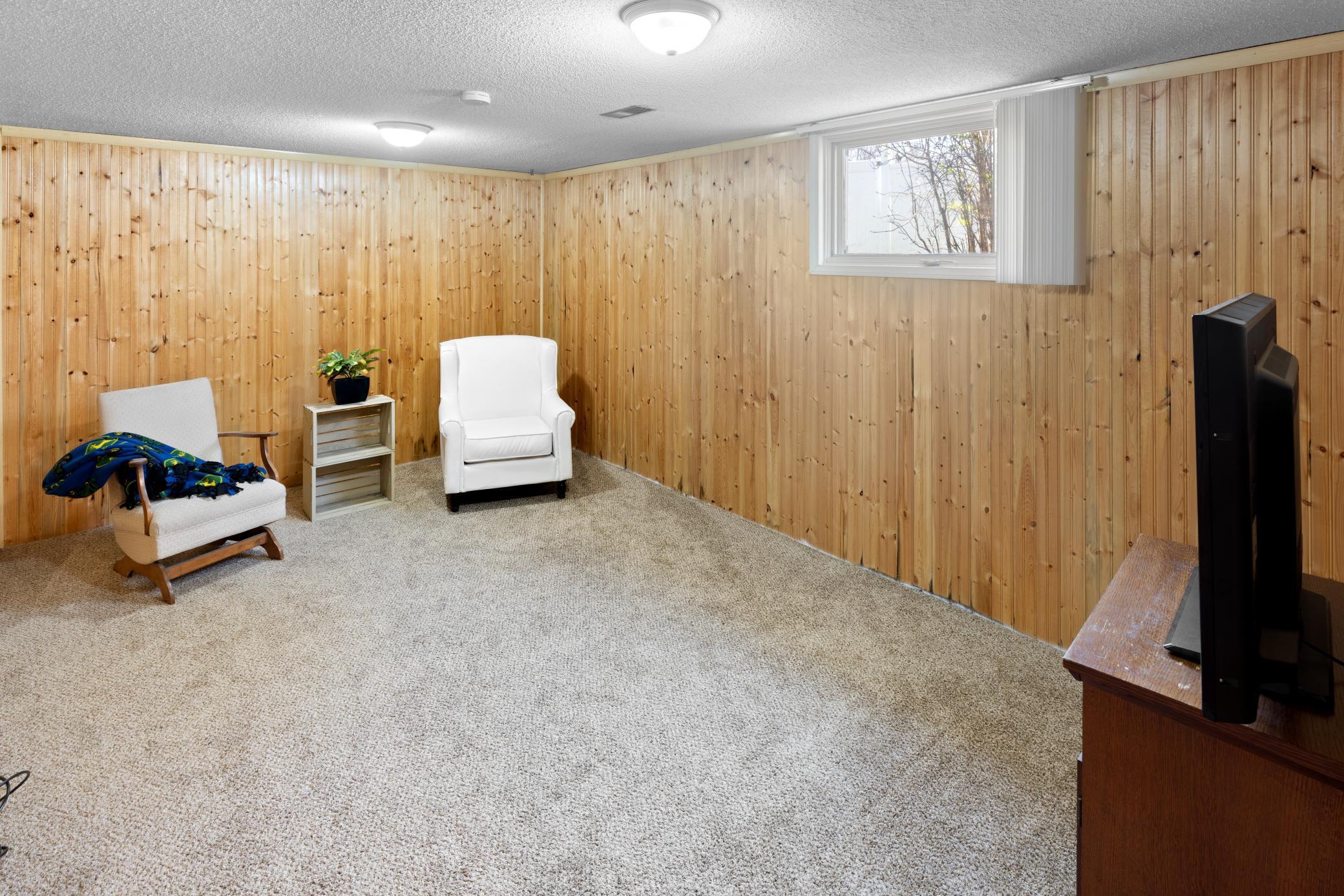 Lower Level Family Room with lookout window.