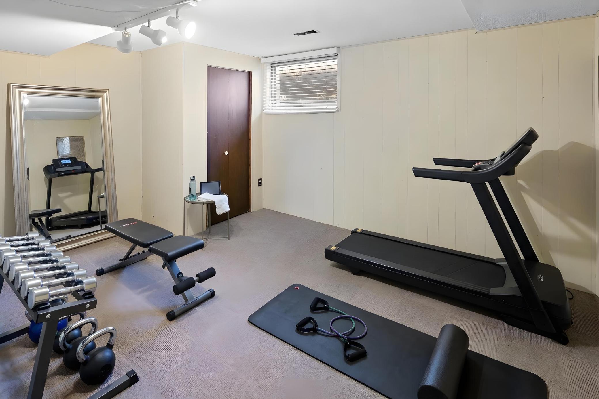 SAME ROOM VIRTUALLY STAGED AS WORKOUT ROOM!