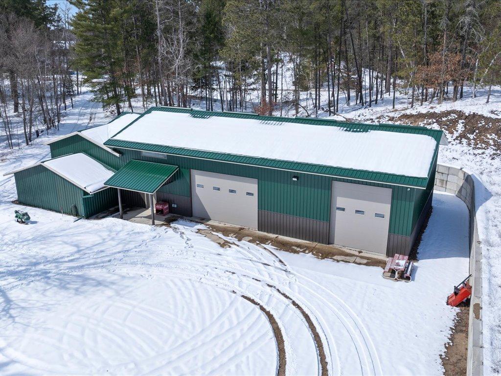 Great start to create the Shous you have always wanted. There is a 3/4 bath, washer/dryer and upper living area. All you need is to add your kitchen area.