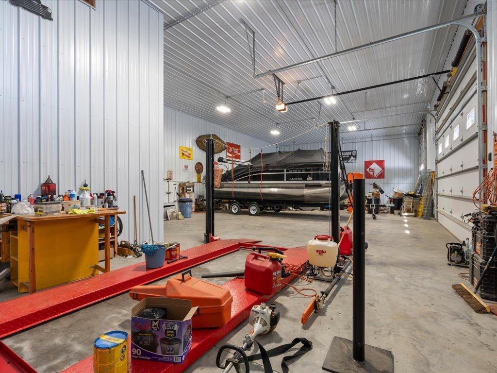 Ample area for you tools and room to work. There is a floor drain, plus soft water available for washing vehicles.