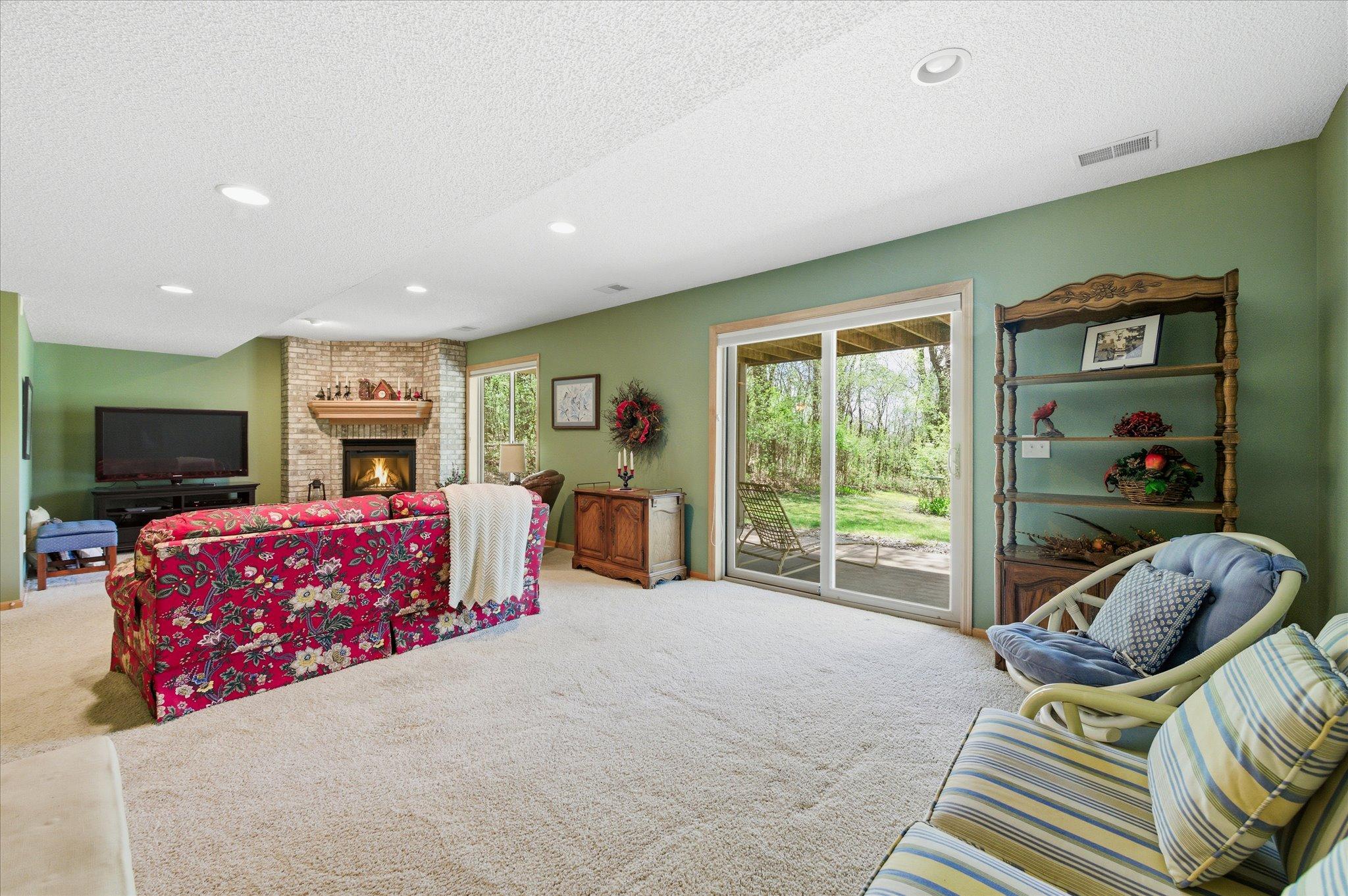 Slider to patio and spacious wooded lot