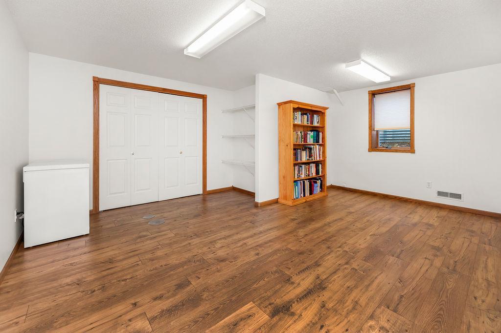 Bedroom 4. Basement bedroom currently used as storage/flex.